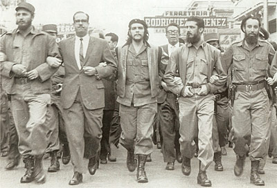 March 5, 1960: Memorial service march for victims of an explosion of a ship in Havana. On the far left of the photo is Fidel Castro, while in the center is Che Guevara