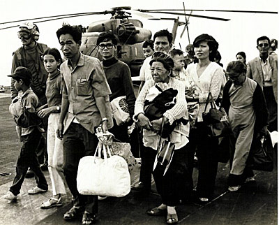 South Vietnamese Refugees Boarding a U.S. Navy Vessel